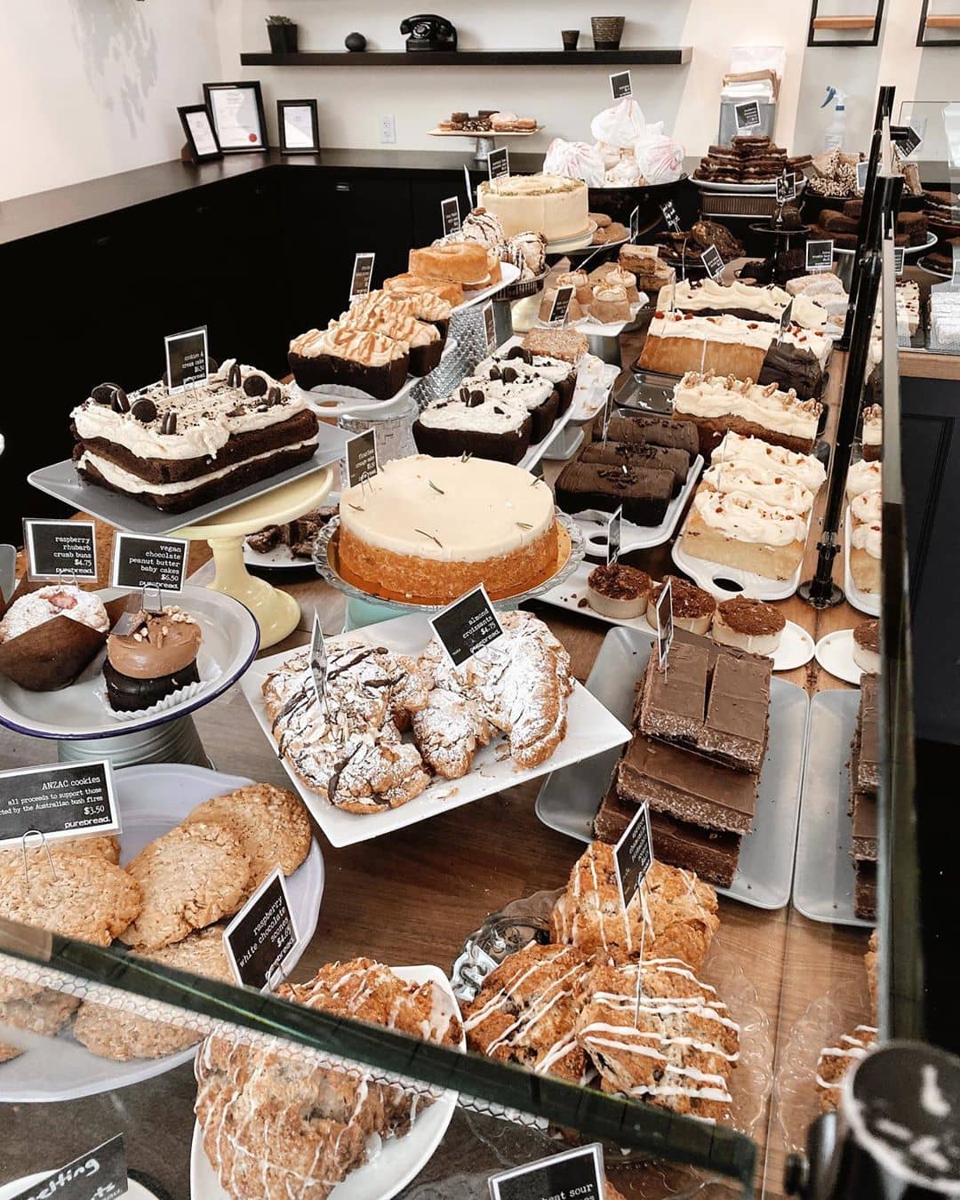 table full of various baked good and pasteries