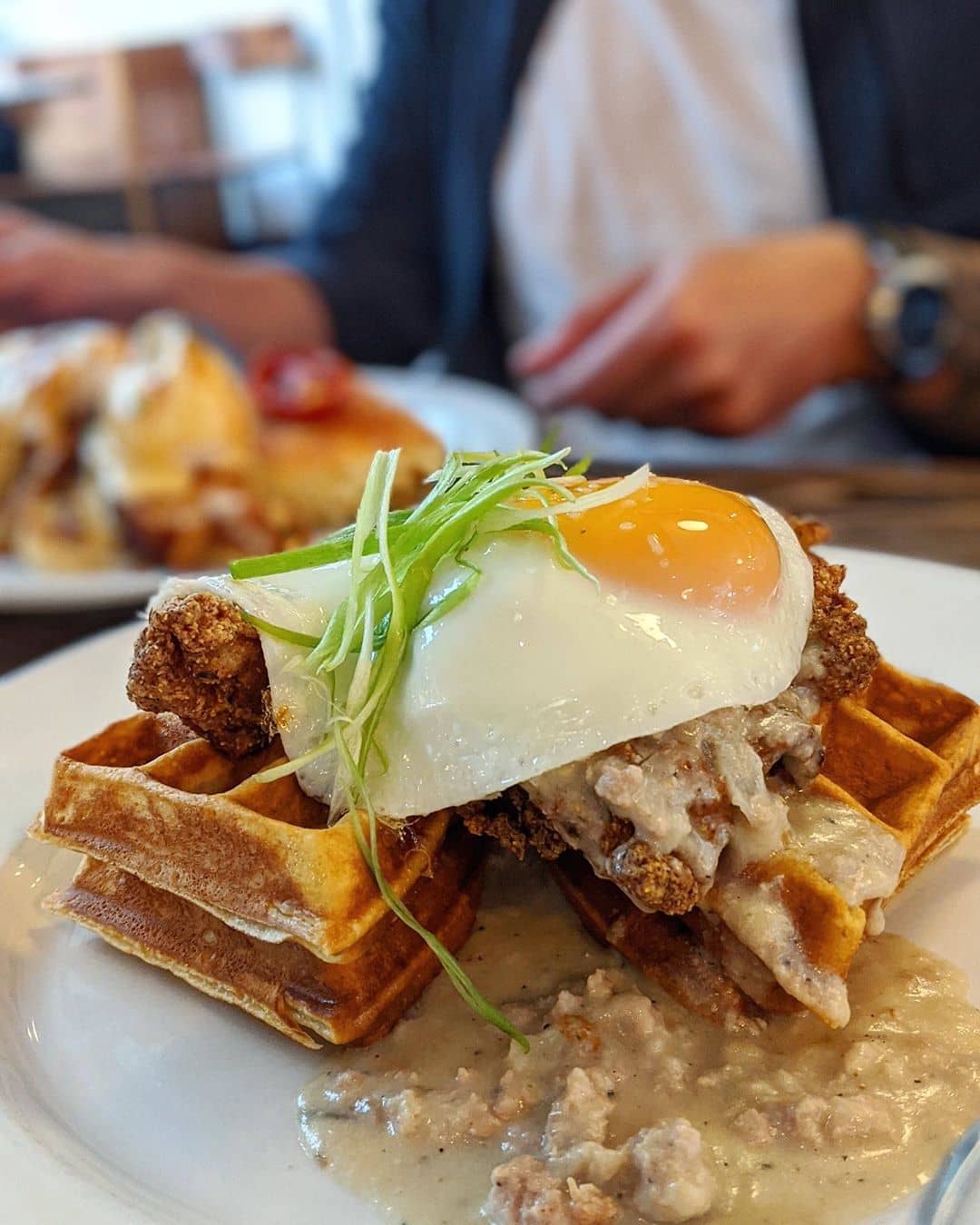 sunny side egg ontop of waffles