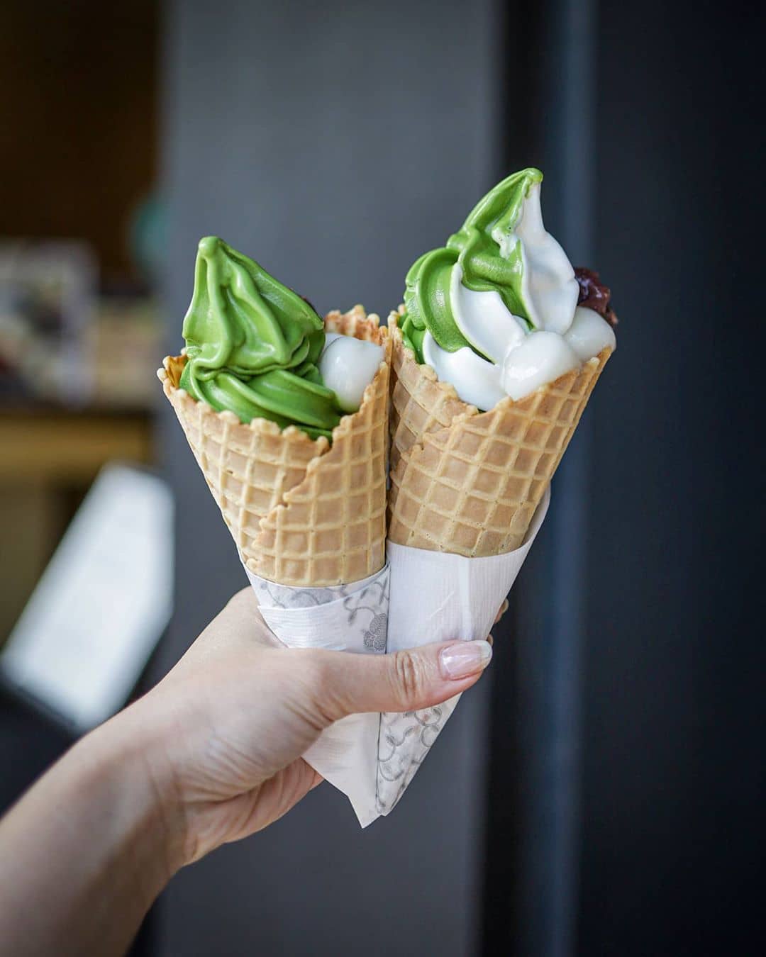 two matcha ice cream soft serve cones