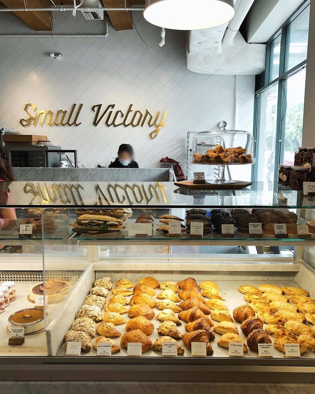 croissant and baked goods in counter cafe