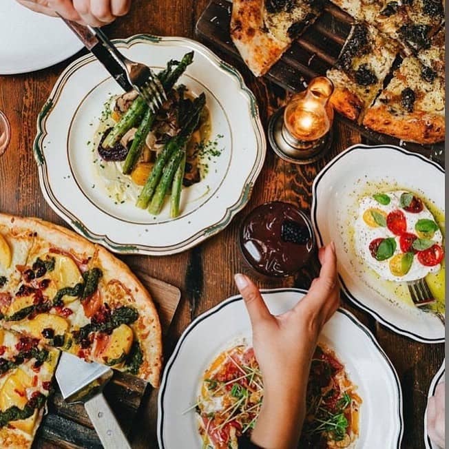 pizza and wine on plates