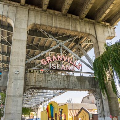 Granville Island neighbourhood guidebook granville island sign under bridge