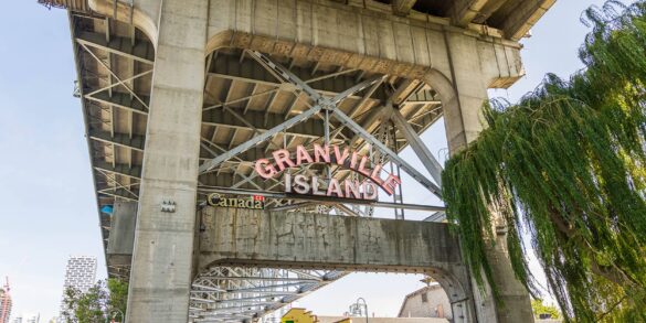 Granville Island neighbourhood guidebook granville island sign under bridge