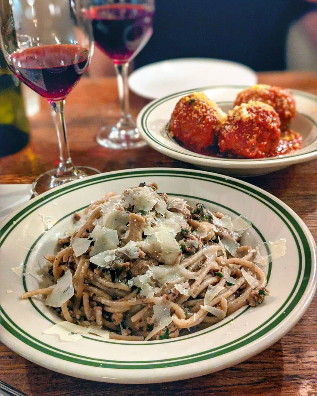 best italian restaurants in vancouver - savio volpe pasta dish with wine