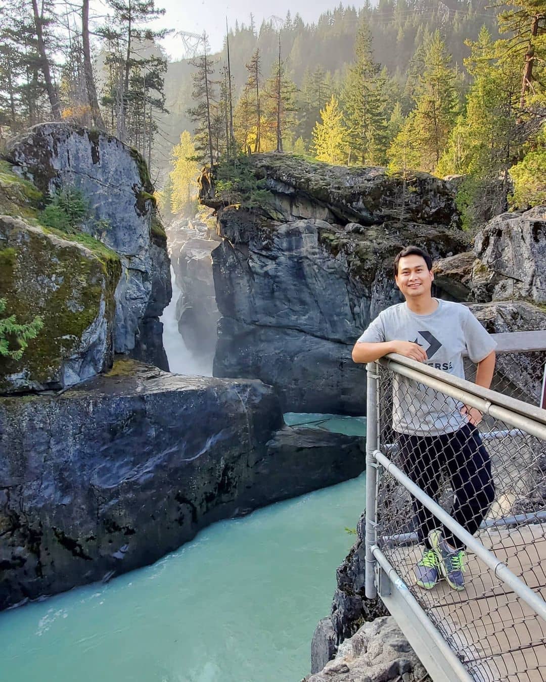 Sea to Sky Highway Guide - Nairn Falls with person standing on ledge