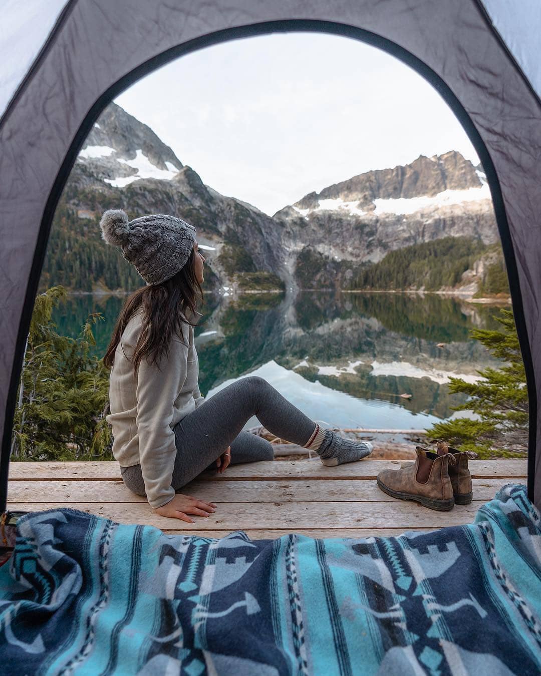 Sea to Sky Highway Guide - Tantalus Range lookout of girl sitting with mountain view