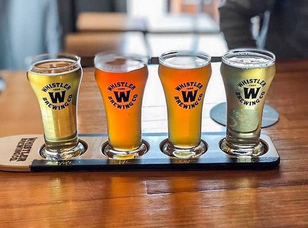Sea to Sky Highway Guide - Whistler Brewing Company beer flight on table