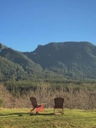 Things to Do in Vancouver When You’re Low on Budget -lower seymour conservation two red chairs among mountain view