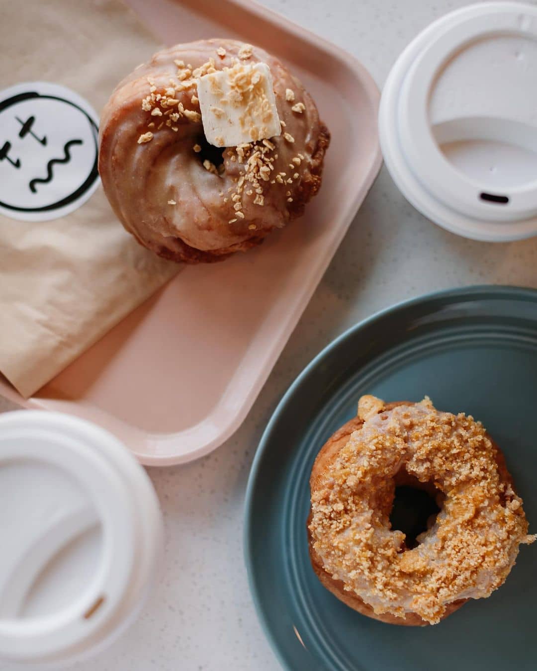 best donuts in vavncouver - their there mochi donuts and coffee cups on table