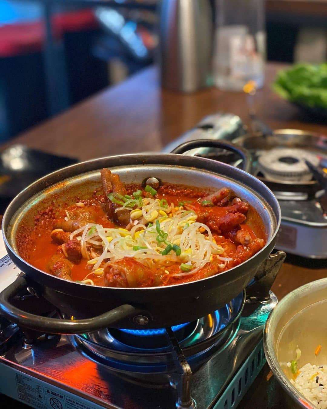 best korean restaurant in richmond - mr.bro korean bistro hot pot bowl with food inside on table