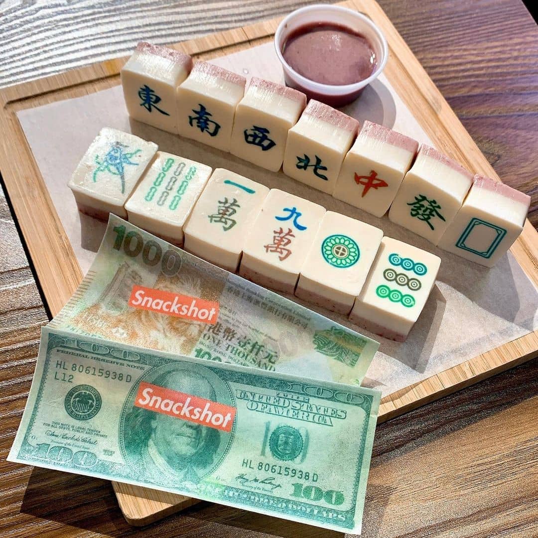 mahjong tiles and fake money on a table - best vancouver dessert - snackshot